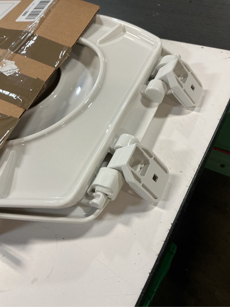 Condition photo showing Good Condition for little2big toilet seat with built-in potty training seat, slow close, durable plastic, made in usa, round, white