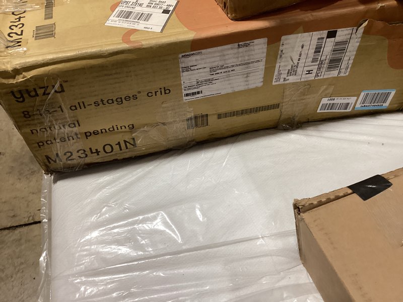 Condition photo showing As Is for babyletto yuzu convertible all-stages® bassinet, midi, full-size crib in natural, greenguard gold certified, portable & adjustable with conversion kits and pads included