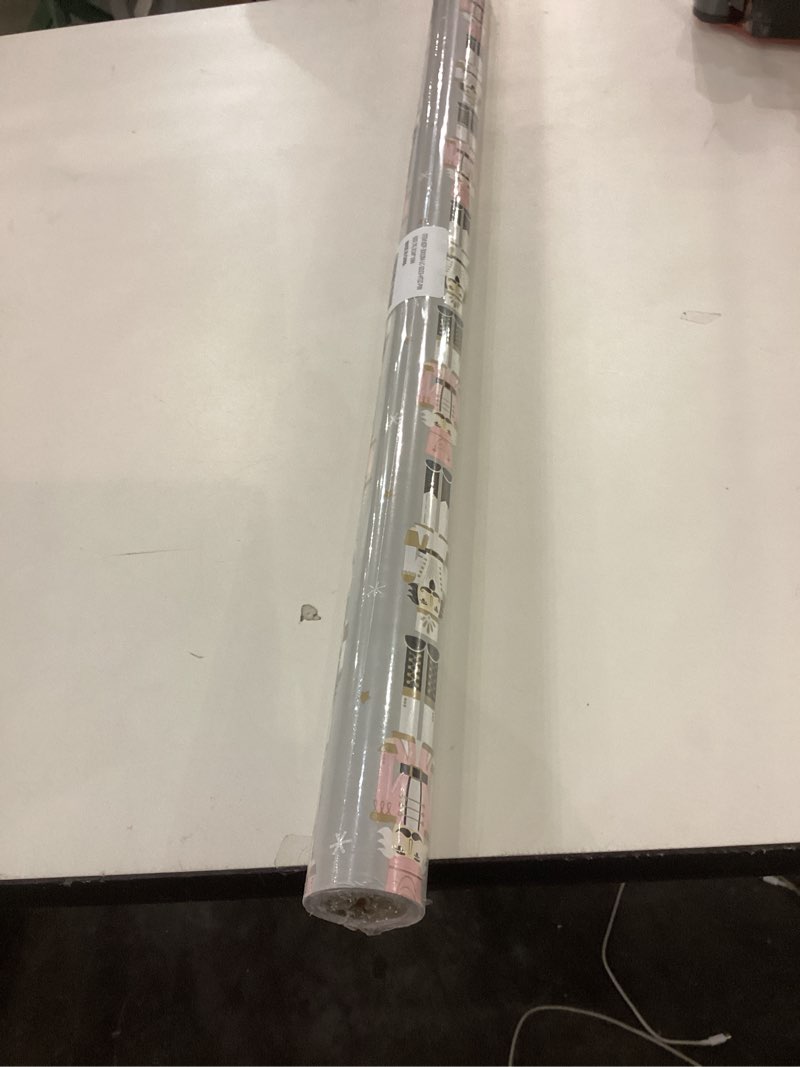 Condition photo showing New/Like New for WRAPAHOLIC 30 Inch Reversible Nutcracker Christmas Wrapping Paper - 30 Inch x 33 Feet - Nutcracker and Candy Cane Design Printed on Pearlized Paper for Chrsitmas, Holiday, Party Celebration 30 inch x 33 feet (Pack of 1) Pink - Nutcracker & Candy Cane