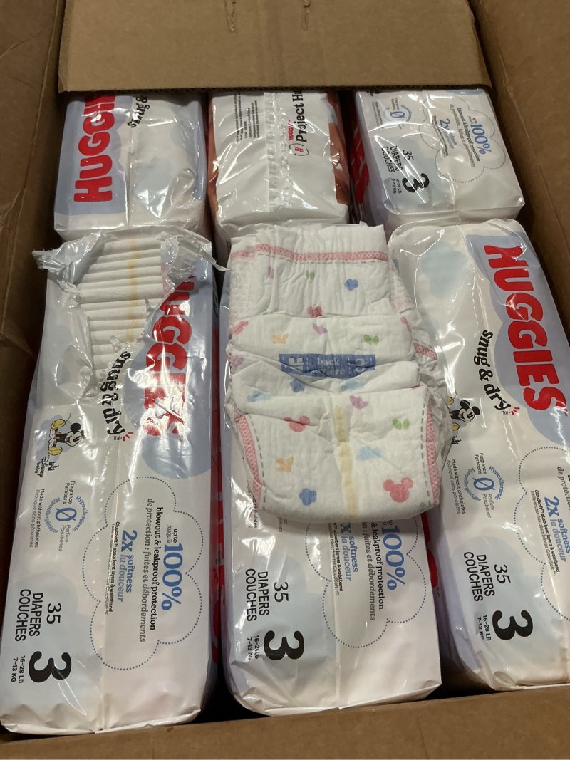 Condition photo showing As Is for Huggies Snug & Dry Disposable Diapers - Econ+ Pack - Size 3 - 210ct