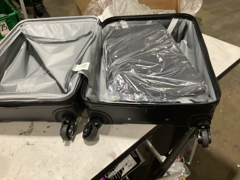 Condition photo showing Good Condition for protege 2-pc hardside luggage set, includes 20 in carry-on luggage and 18 in duffel, black, all ages (does no include check in bag)