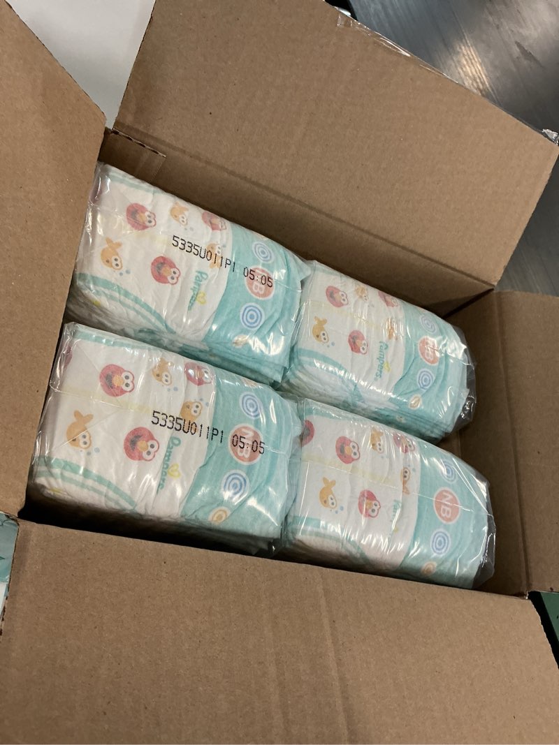 Condition photo showing New/Like New for pampers diapers - baby dry - size 0, 104 count, absorbent disposable newbort diaper (packaging may vary) newborn 104