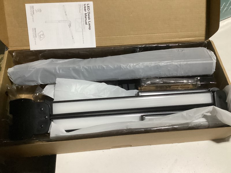 Condition photo showing As Is for ONEMIX 42" LED Desk Lamp for Home Office, Eye-Caring Desk Light with Adjustable 4-Segment Bar, 1800LM Bright, Remote, Architect Table Lamp with Base for Dual Monitors, Reading, Study, Workbench(Black) Black Plus