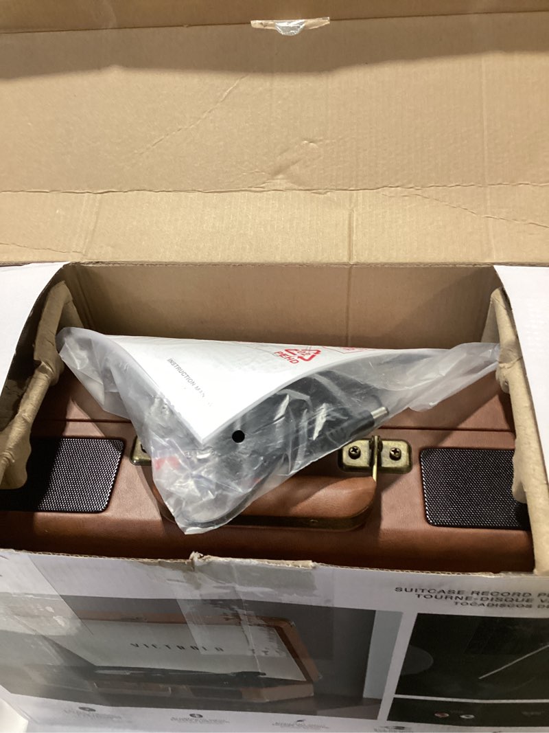 Condition photo showing item condition for Victrola Journey Bluetooth Portable Suitcase Record Player – with Built-in Speakers, 3 Speed Vinyl Record Player, RCA Out, Headphone Jack (Brown)