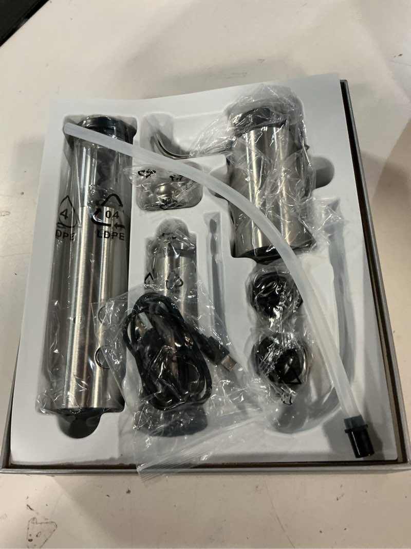 Condition photo showing Good Condition for circle joy rechargeable electric wine opener set 8-in-1 stainless steel automatic wine bottle opener gift set w/electric wine aerator pourer, foil cutter, wine drip ring, vacuum pump & 2 wine stoppers 8-in-1 deluxe wine set - silver