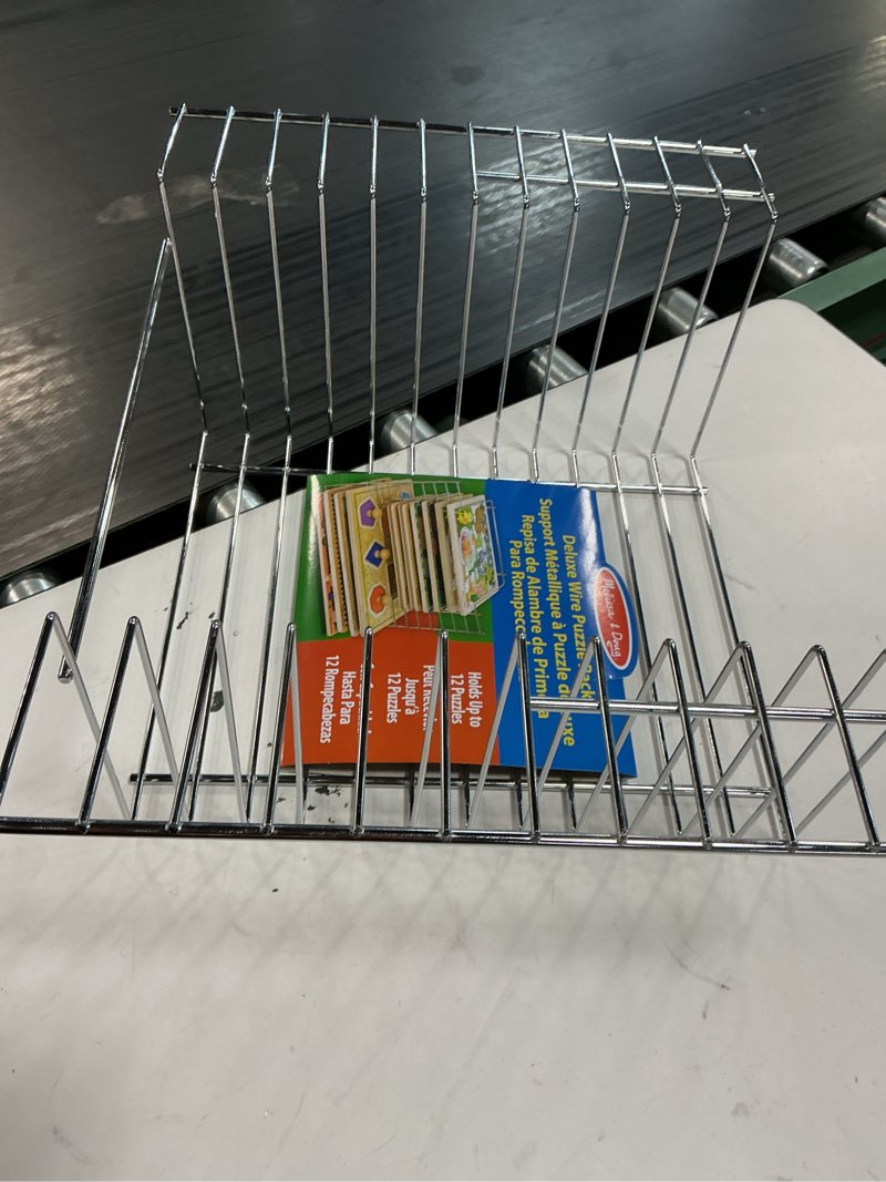 Condition photo showing Good Condition for melissa & doug deluxe metal wire puzzle storage rack for 12 small and large puzzles