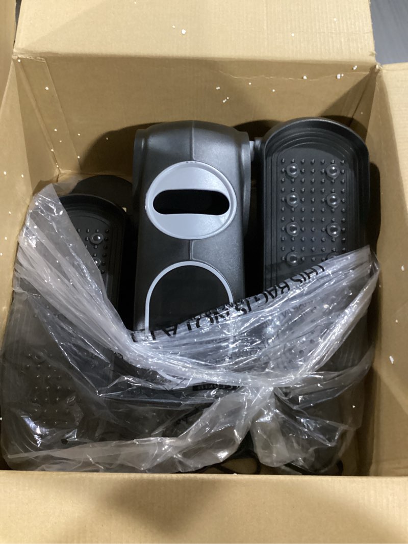 Condition photo showing As Is for merach under desk elliptical machine, leg exerciser while sitting for seniors with 12-speeds & remote control, quiet portable electric seated pedal exerciser machine for home office