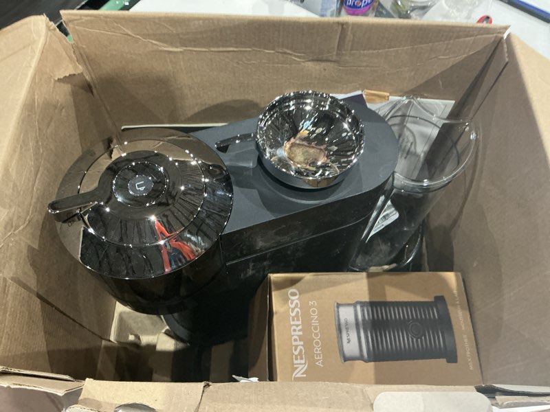 Condition photo showing As Is for nespresso vertuo next deluxe coffee and espresso maker, pure chrome with aeroccino milk frother,1.1 liter, black,dark chrome chrome machine + milk frother