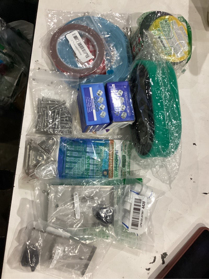 Condition photo showing As Is for assorted home improvement lot (small tools, screw, home accessories, etc.)