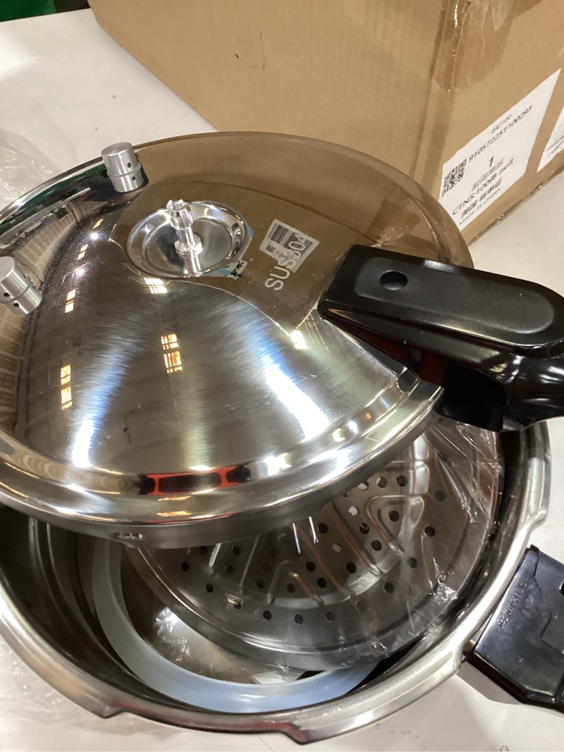 Condition photo showing Good Condition for wantjoin pressure cooker stainless steel 6.5 qt, commercial stove top pressure cooker pot used for pressure foodie or steaming, compatible with gas & induction cooker 6.5 quarts