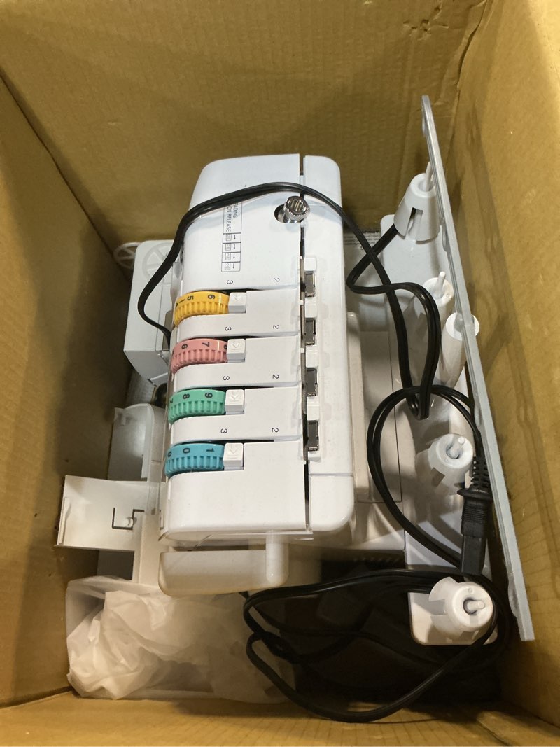 Condition photo showing As Is for Brother Serger, 1034D, Heavy-Duty Metal Frame Overlock Machine, 1,300 Stitches Per Minute, Removeable Trim Trap, 3 Included Accessory Feet, White