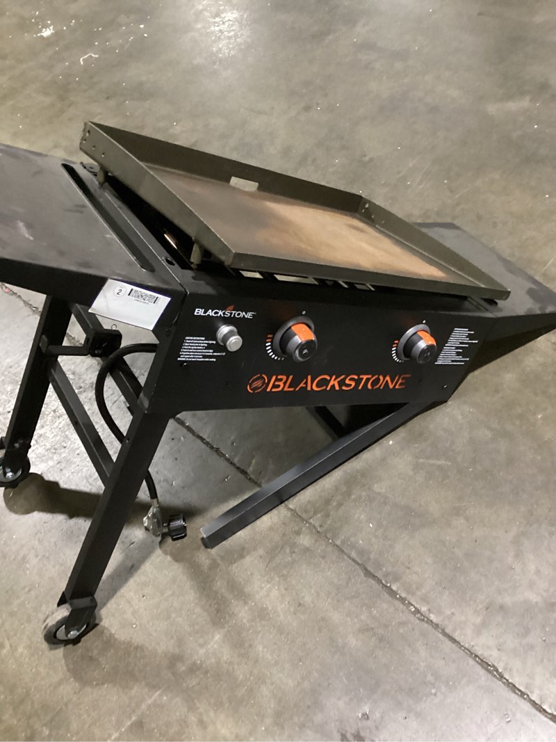 Condition photo showing As Is for blackstone 28 inches omnivore griddle