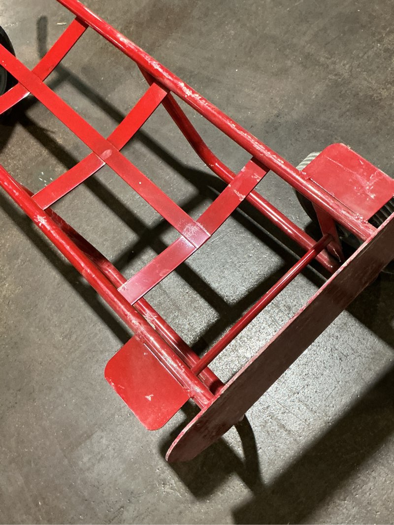 Condition photo showing As Is for milwaukee milwaukee dual handle truck with stair climbers