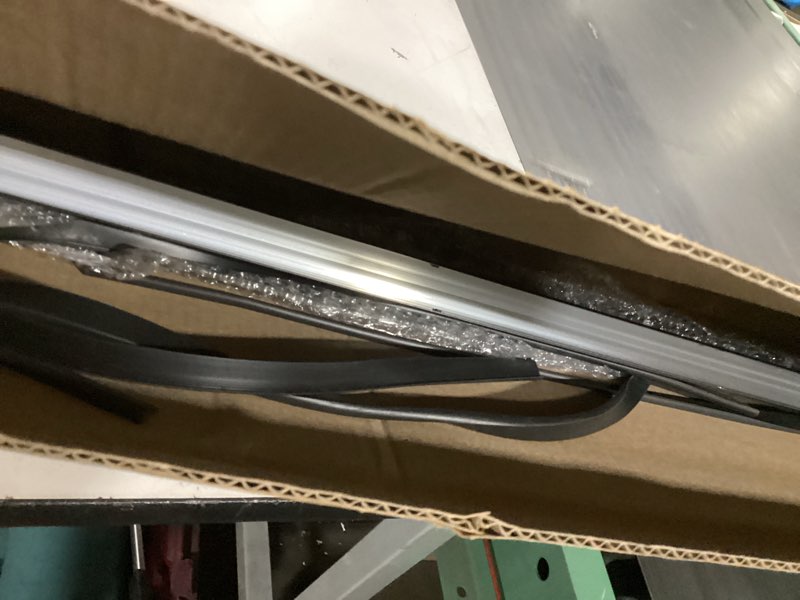 Condition photo showing As Is for 1 pack 1" x 35.5" storm door sweep replacement bottom sweep aluminum expander for 1" thickness security storm door weatherstripping(black) 35.5" black 1