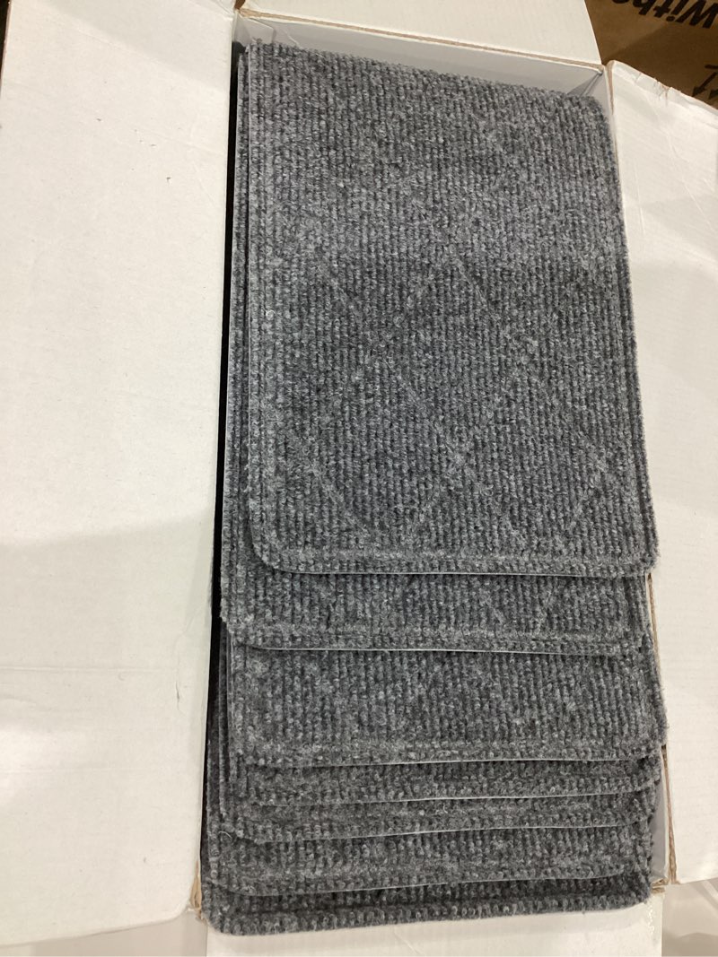Condition photo showing Good Condition for kooteta stair treads for wooden steps indoor, 15 pack 8" x 30" non slip carpet stair treads with reusable adhesive for kids elders and dogs, surface polyester tpr backing stair runner rugs, dark grey 8" x 30" dark grey 15