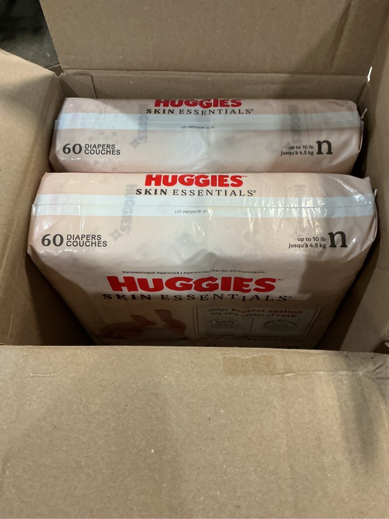 Condition photo showing As Is for Huggies Size Newborn Diapers, Skin Essentials Baby Diapers, Size Newborn (6-9 lbs), 180 Count (3 Packs of 60), Packaging May Vary Newborn 180 (missing 1 pack of 60)