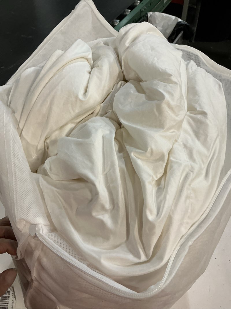 Condition photo showing As Is for luxe goose down comforter king 
