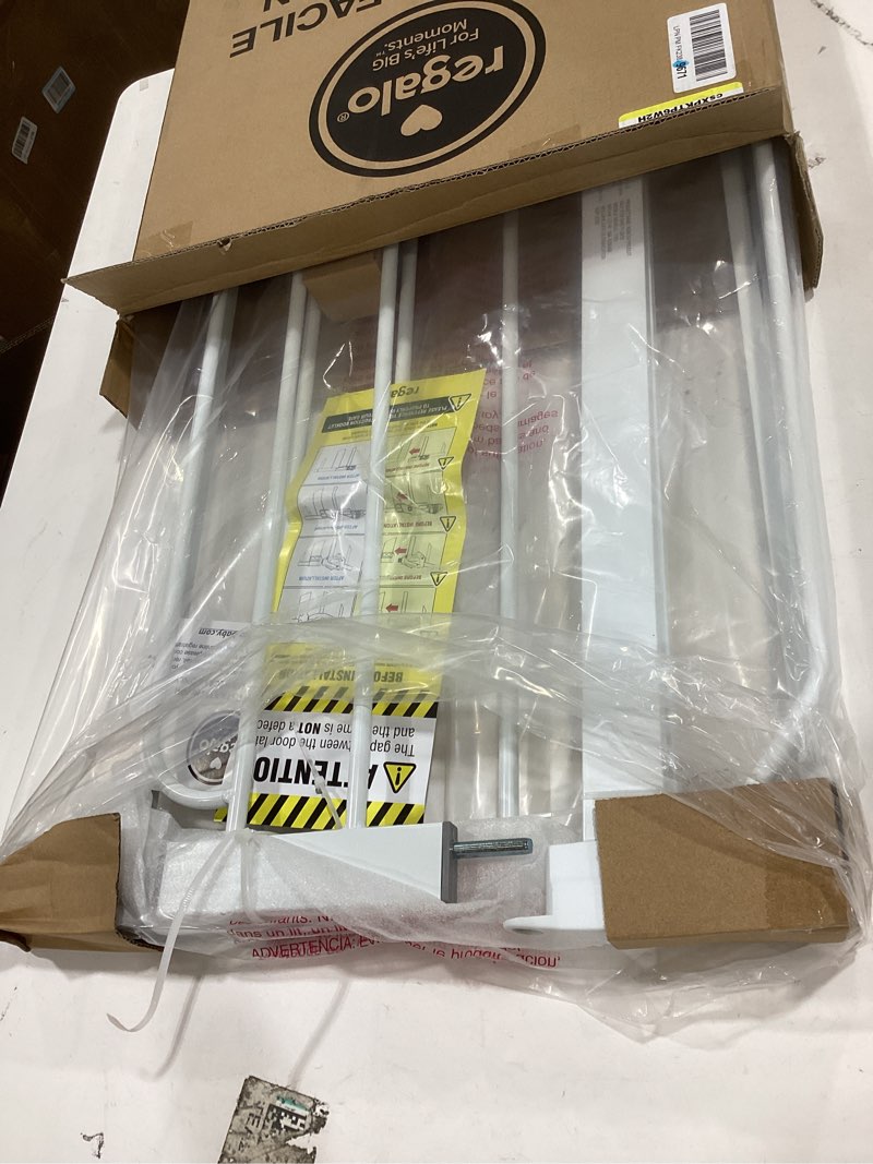 Condition photo showing New/Like New for regalo safety 38" baby gate for doorways & bottom of stairs, pressure mount design for babies, toddlers & pets, tested & safe for 30 years, american designed, american owned, white white 29-38.5"w x 30"h