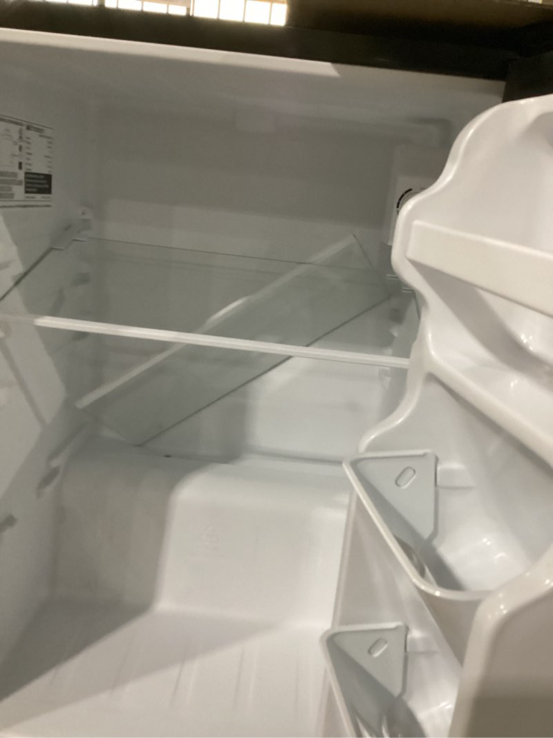 Condition photo showing Good Condition for emerson cr2700b-a compact refrigerator 2.7 cu ft, energy star mini fridge with adjustable thermostat, reversible door, glass shelves, manual defrost, black