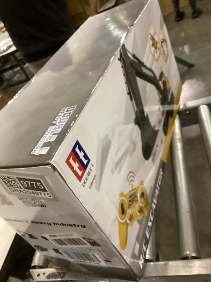 Condition photo showing As Is for DOUBLE E Volvo RC Excavator 17 Channel 3 in 1 Construction Toys, 17 Channel Remote Control Vehicles Tractor Sandbox Toys Digger with Metal Shovel Drill Grab RC Truck for Kids Adults