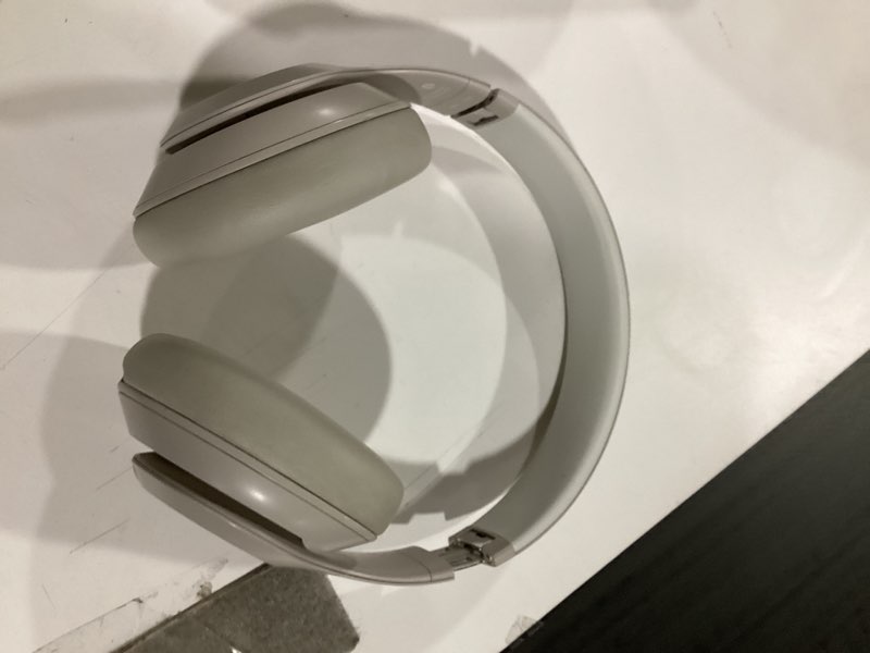 Condition photo showing As Is for **various colors** Beats Studio Pro-Premium Wireless Over-Ear Headphones- Up to 40-Hour Battery Life, Active Noise Cancelling, USB-C Lossless Audio, Apple & Android Compatible- Sandstone Sandstone Beats Studio Pro