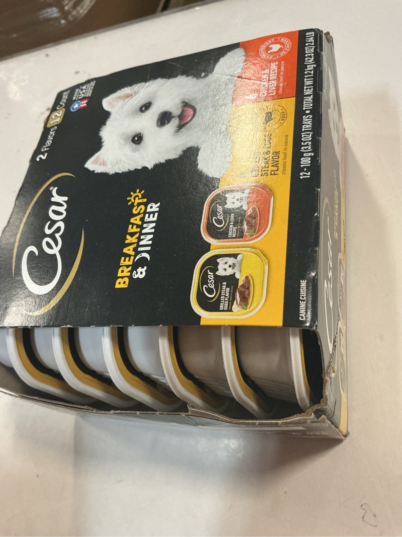 Condition photo showing New/Like New for (BB:06/27/27) Cesar Wet Dog Food Classic Loaf in Sauce, Beef Recipe, Filet Mignon Flavor, Grilled Chicken Flavor, and Porterhouse Steak Flavor, 3.5 oz. Easy Peel Trays, Variety Pack of 24 Steak & Eggs, Chicken & Liver 12 Count (Pack of 1)