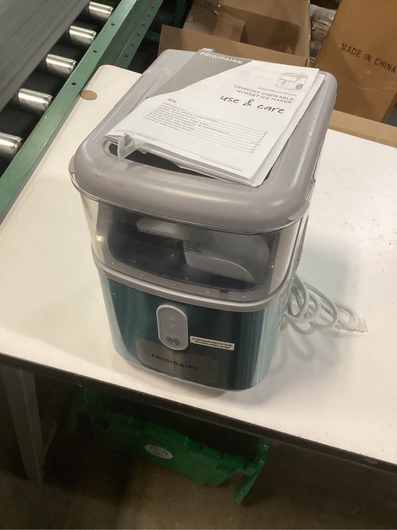 Condition photo showing As Is for frigidaire countertop crunchy chewable nugget ice maker, compact, 33lbs per day, metallic finish