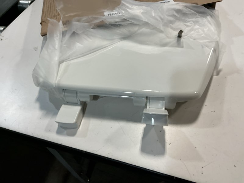 Condition photo showing As Is for bemis 730slec slow close toilet seat, easy clean hinges and durable plastic seat, made in usa, round, white round slow close