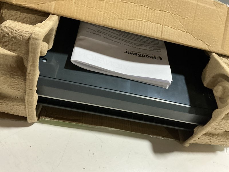 Condition photo showing As Is for FoodSaver Vacuum Sealer Machine, Automatic Bag Detection, Sous Vide Friendly, with sealer bags, roll, handheld vacuum sealer, black Vacuum Sealer + Accessories