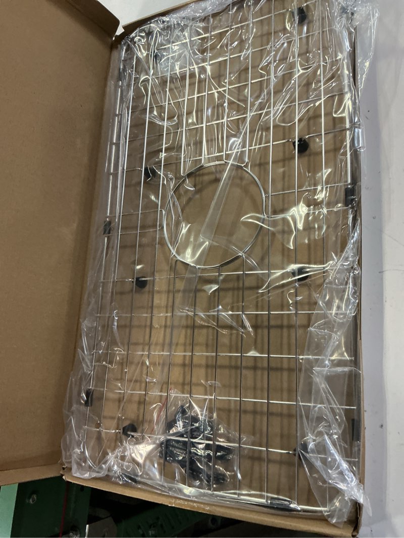 Condition photo showing Good Condition for serene valley sink bottom grid 24-1/8" x 12-5/8", centered drain with corner radius 1-1/2", sink protector nlw2412c