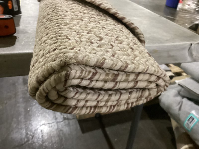 Condition photo showing As Is for nuloom oval 3' x 5' solid hand braided indoor/outdoor area rug, pet-friendly, high traffic, weather resistant, for patio, balcony, bedroom, living, dining room, wynn tan tan 3' x 5' (oval)