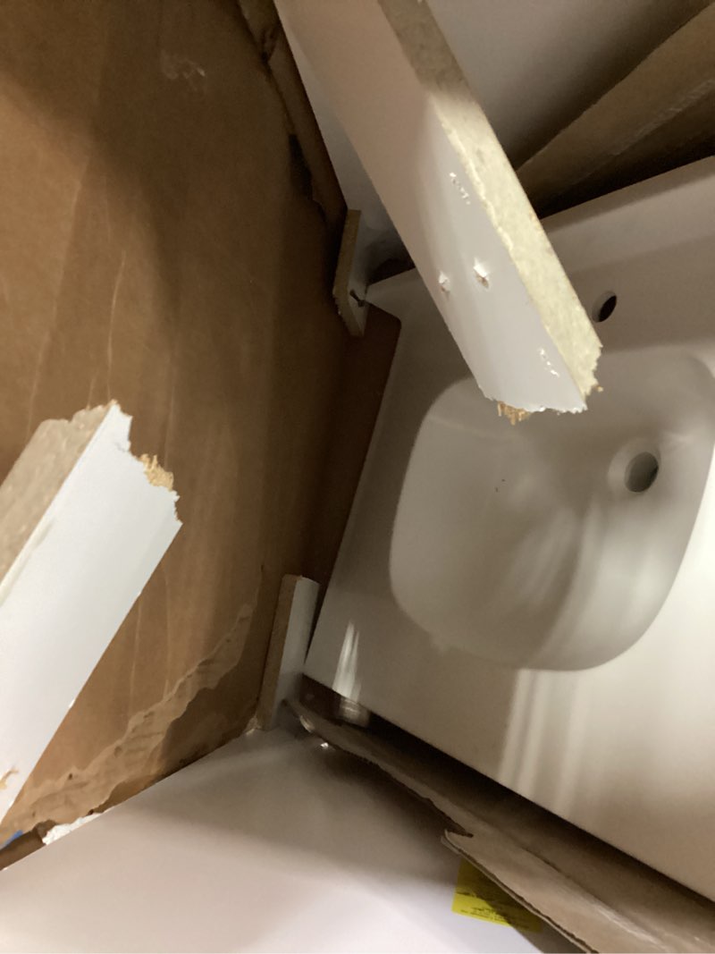 Condition photo showing As Is for project source 24-in white single sink bathroom vanity with white cultured marble top