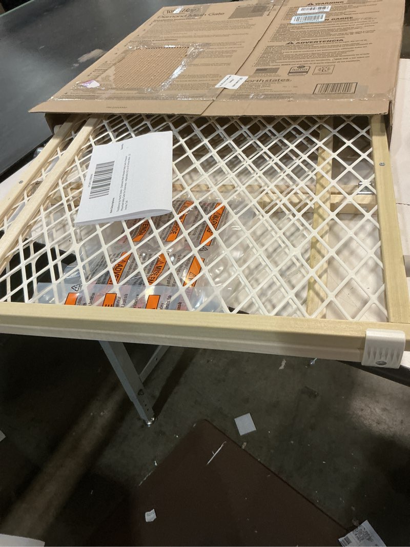 Condition photo showing Good Condition for toddleroo by north states diamond mesh wooden baby gate: 26.5"- 42" wide. pressure mounted baby gate for doorway. (23" tall, sustainable hardwood)