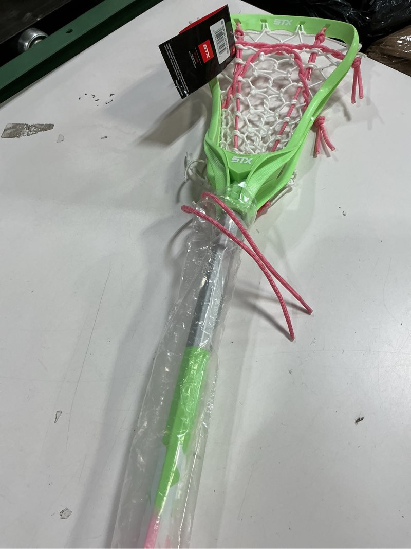 Condition photo showing New/Like New for STX Lacrosse Girls Crux Jr. Complete Stick Green