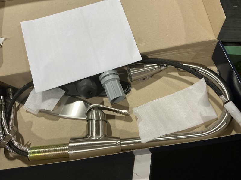 Condition photo showing As Is for Project Source Brushed Nickel 2-Handle Deck Mount Pull-Down Kitchen Faucet