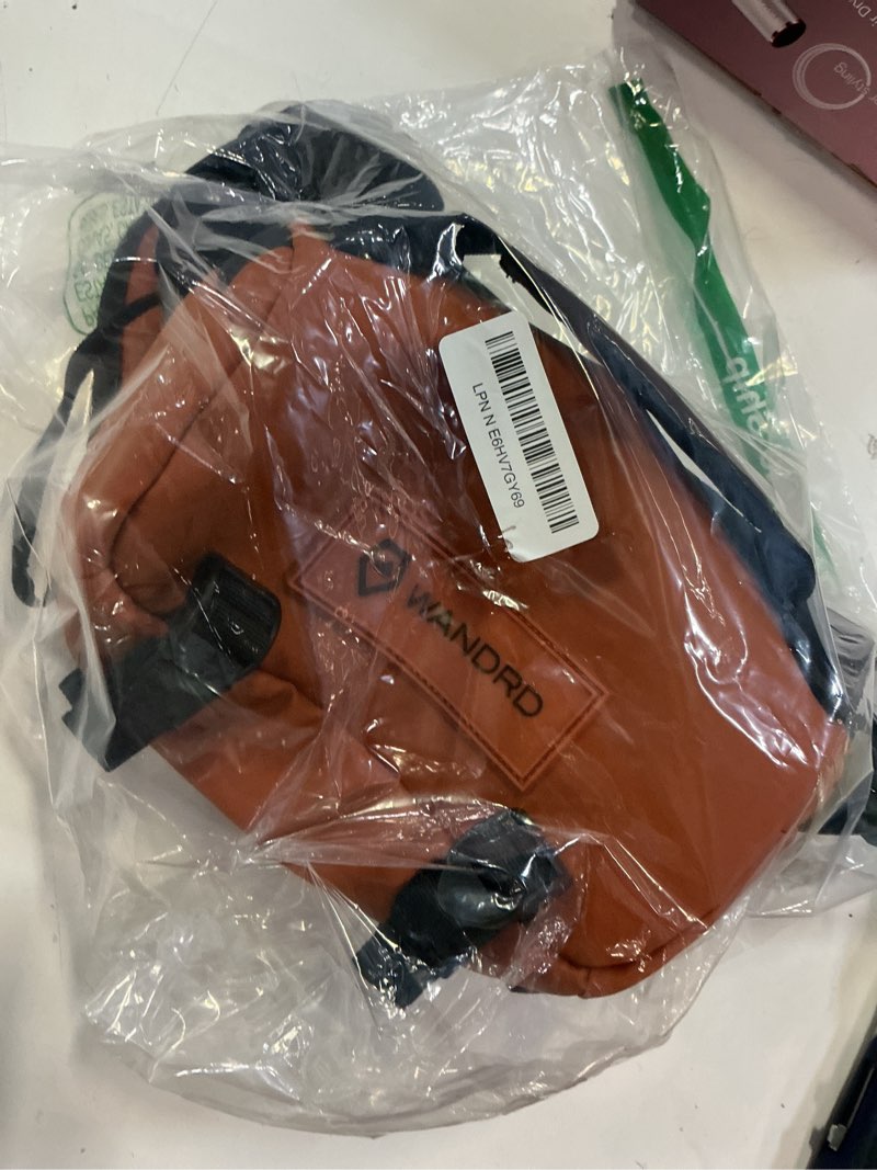 Condition photo showing Good Condition for wandrd rogue v1 6l sling: compact camera sling and crossbody bag with fast access, 3-way carry– lightweight everyday bag great for travel, photography, and daily use (sedona orange) sedona orange 6l