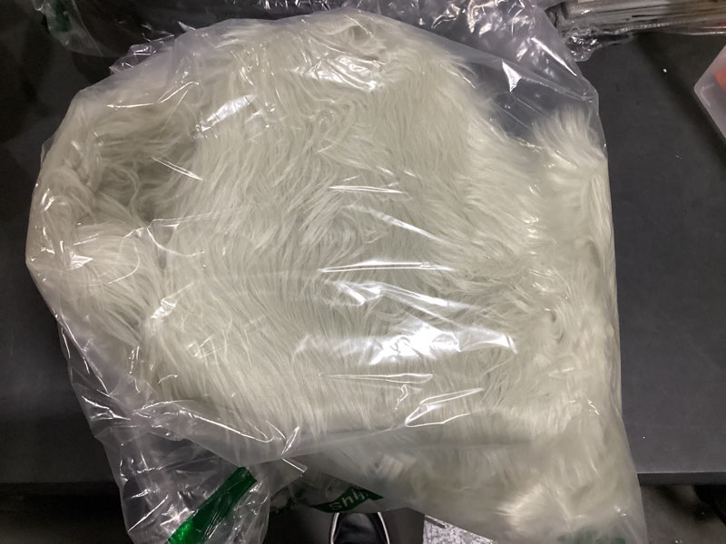 Condition photo showing New/Like New for EasyJoy Ultra Soft Fluffy Shaggy Area Rug Faux Fur, Chair Cover, Fuzzy Seat Pad for Bedroom Floor Sofa Living Room (2 x 6 ft Sheepskin, Light Grey) Light Grey 2' x 6' (Sheepskin)