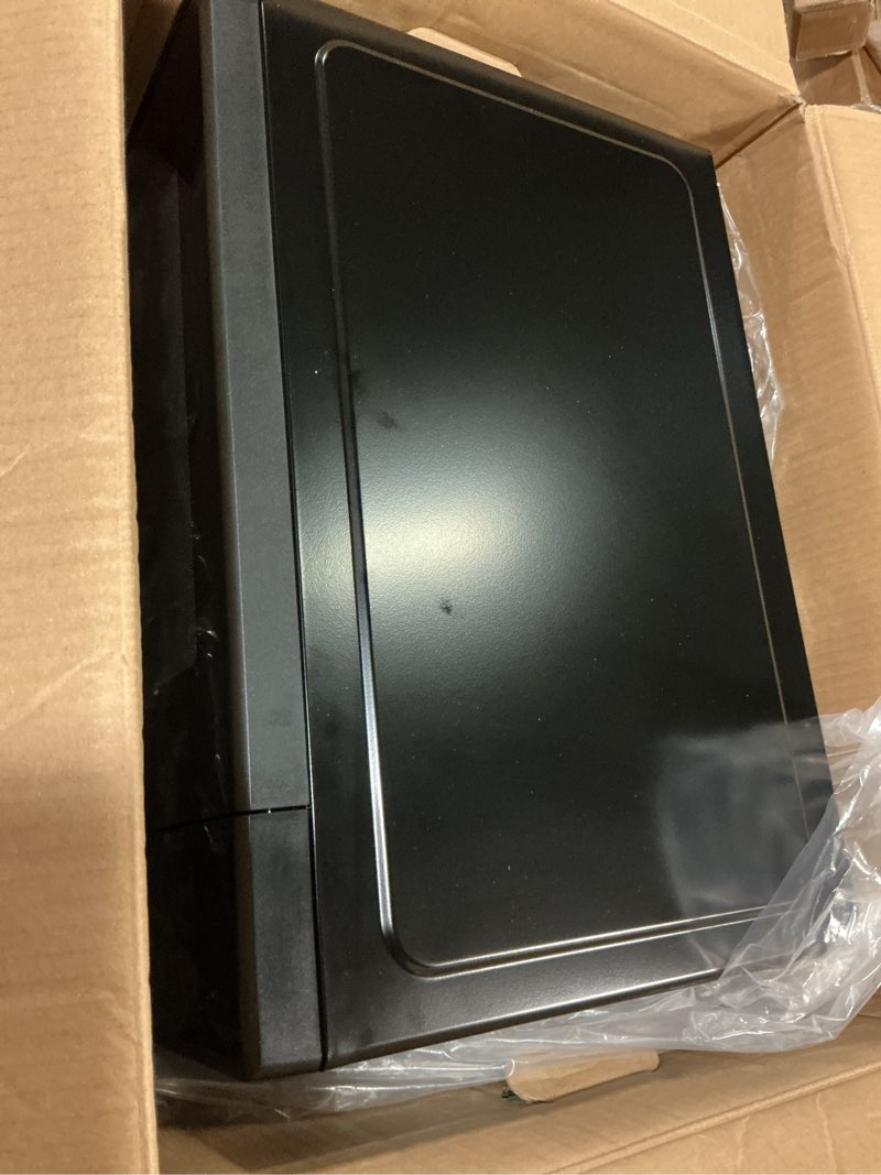 Condition photo showing As Is for mainstays 1.1 cu ft microwave oven in black