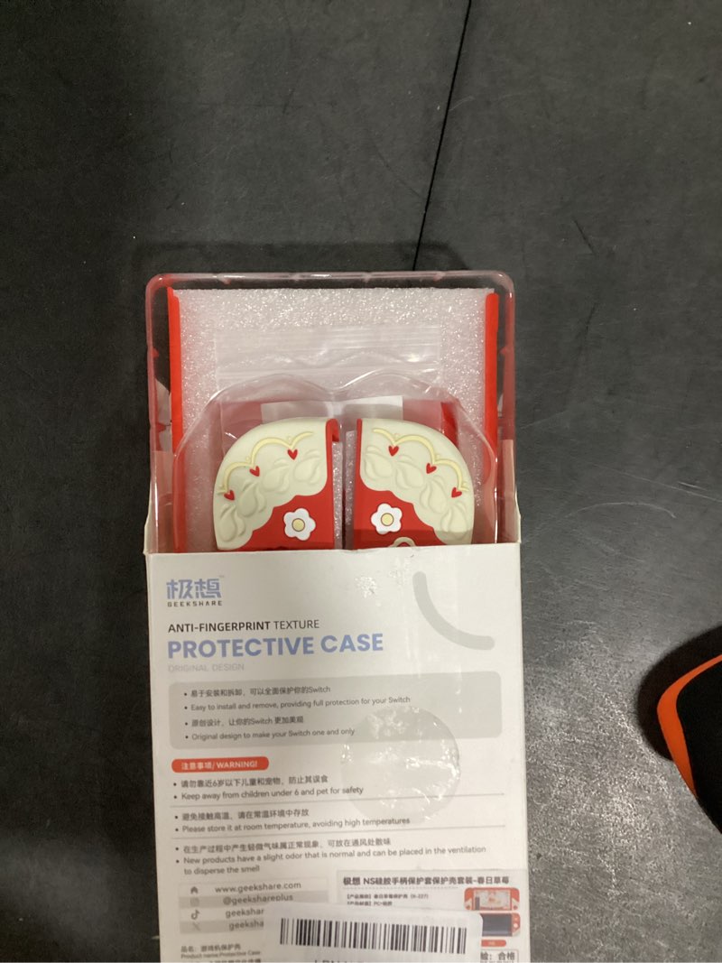 Condition photo showing Good Condition for geekshare protective case for switch slim cover case compatible with switch separable soft silicone protective shell for joysticks with 2 thumb grip caps- strawberries with cream for switch 1 red strawberries