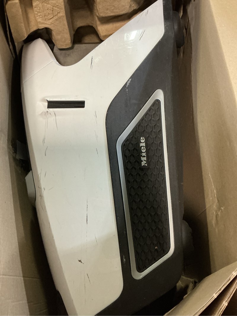 Condition photo showing As Is for miele blizzard cx1 cat & dog bagless canister vacuum, lotus white - pet hair, portable lotus white cat & dog