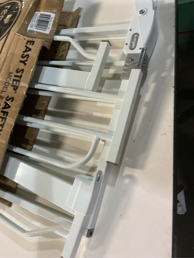 Condition photo showing Good Condition for regalo safety 29-38.5" baby gate for doorways & bottom of stairs, pressure mounted baby gate with door for babies, toddlers & pets, tested & safe for 30 years, american designed, american owned, white white 29-38.5"w x 30"h