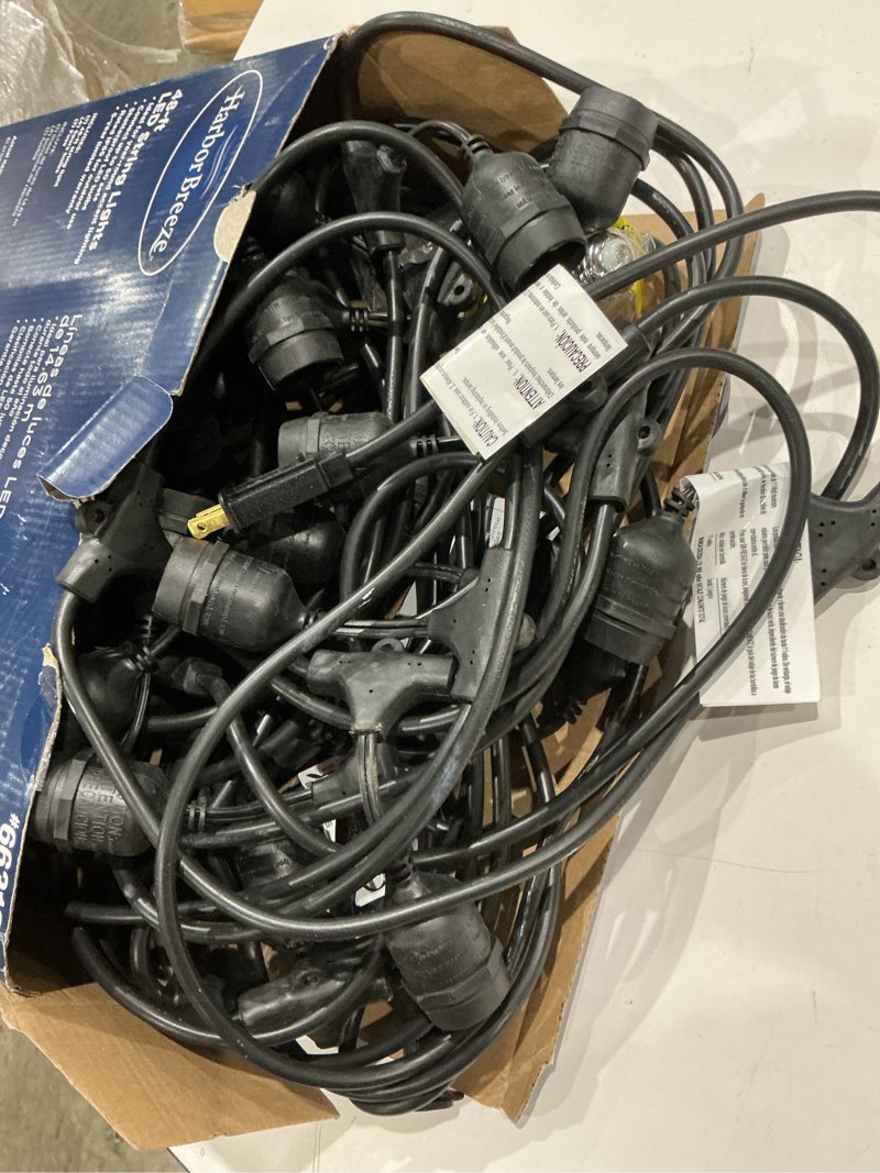 Condition photo showing As Is for harbor breeze 48-ft plug-in black indoor/outdoor string light with 24 white -light led edison bulbs