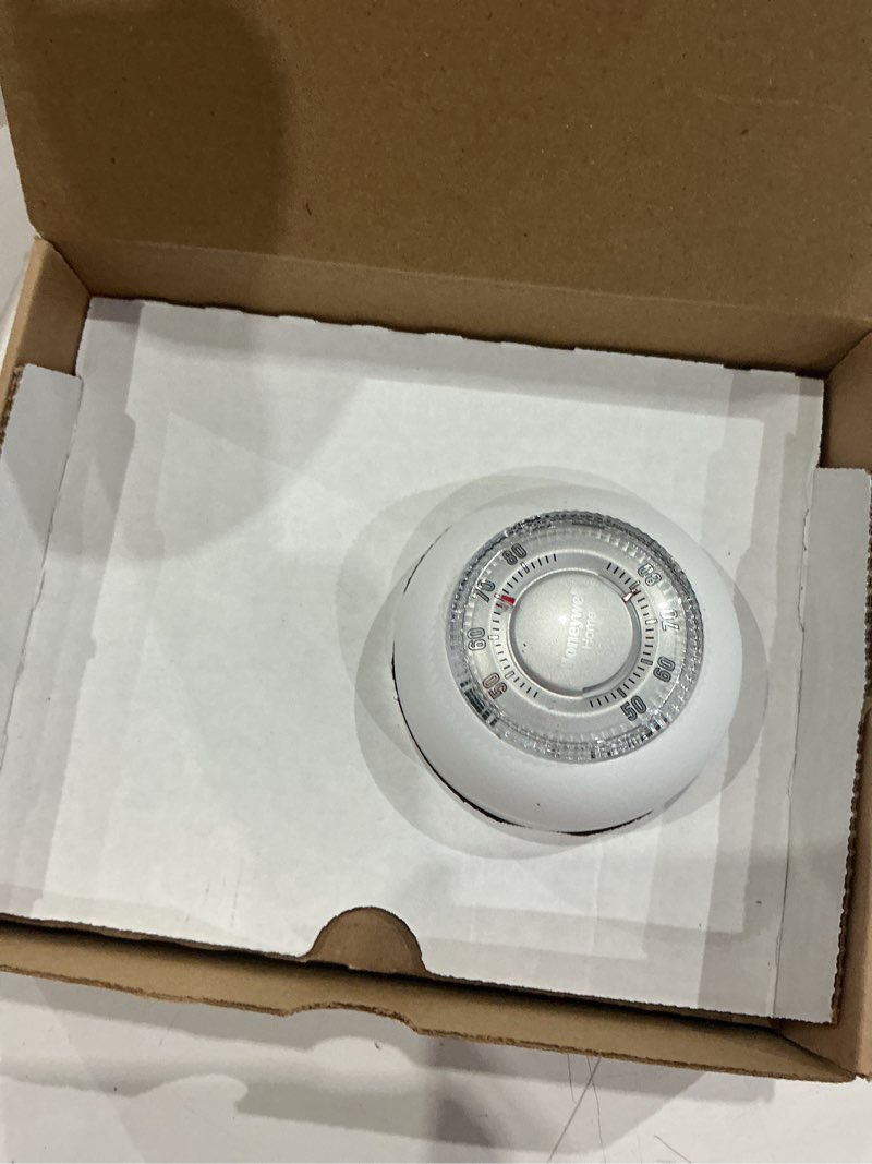 Condition photo showing As Is for honeywell the round mechanical non-programmable thermostat