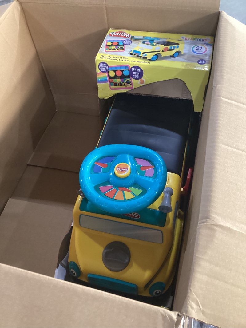 Condition photo showing New/Like New for Play-Doh Activity School Bus - Push and Ride On Toy Car for Kids Up to 44 Lbs, Lights and Sounds. Includes Shape and Number Cutters, Play Doh Set, Kids Ride On Toy, Push Car for Girls and Boys