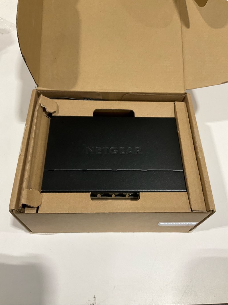 Condition photo showing As Is for netgear 5-port 2.5g multi-gigabit ethernet easy smart managed essentials network switch (ms305e) - with 5 x 2.5gbps ports, desktop or wall mount, metal case 5 port, 2.5g, easy managed