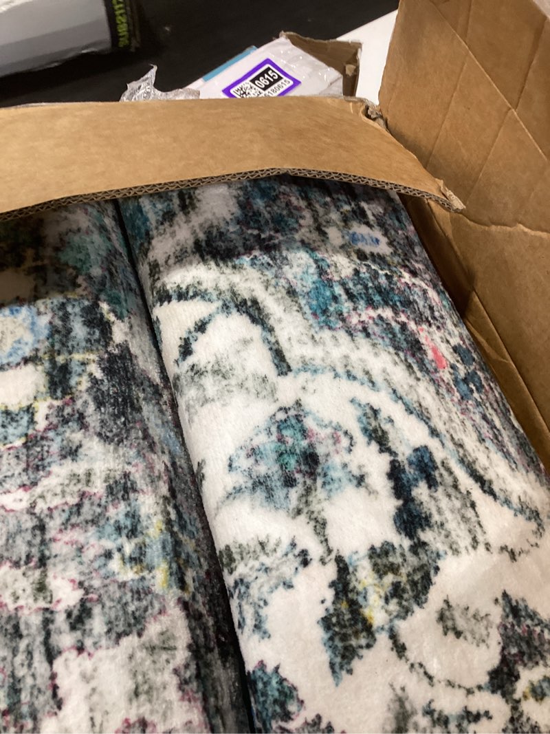 Condition photo showing Good Condition for yarnscape 9' x 12' washable area rug - low pile soft vintage indoor rug for living, dining or bedroom - lightweight carpet with non-slip backing - foldable for easy placement, ocean blue 9' x 12' (rectangular) trellis-ocean blue