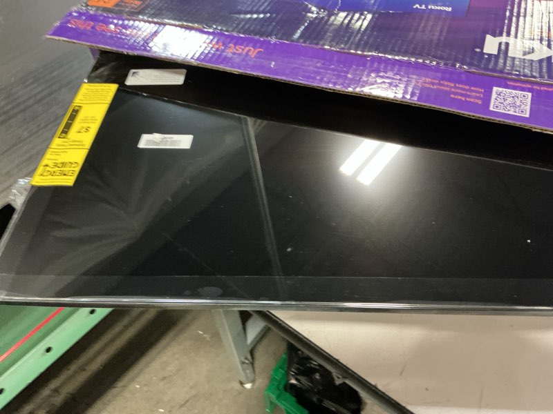 Condition photo showing As Is for roku smart tv – 24-inch select series, 720p hd tv – roku tv with voice remote – flat screen led television with wi-fi for streaming live local news, sports, family entertainment 24" 720p