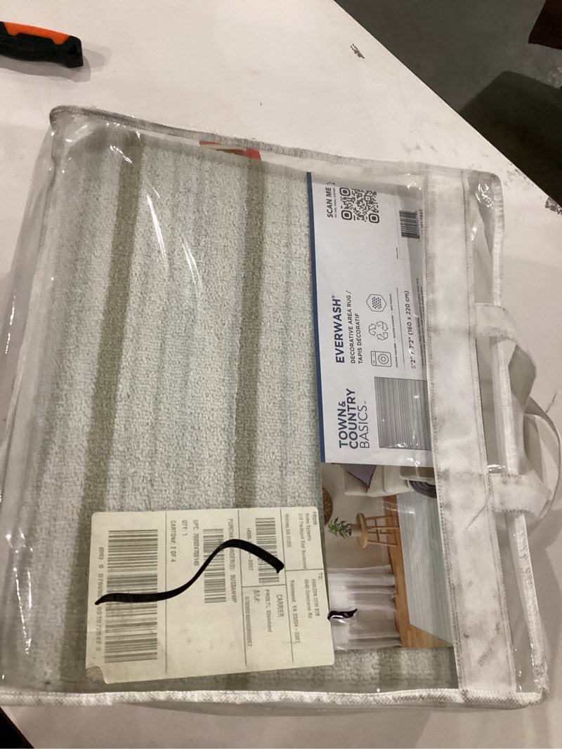 Condition photo showing New/Like New for Town &country basics everywash area rug 5’2”x7’2”