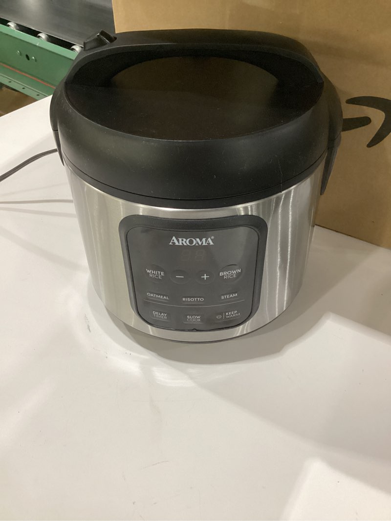 Condition photo showing As Is for AROMA® Digital Rice Cooker, 4-Cup (Uncooked) / 8-Cup (Cooked), Steamer, Multicooker, Slow Cooker, Oatmeal Cooker, Auto Keep Warm, 2 Qt, Stainless Steel Exterior, NOT TESTED