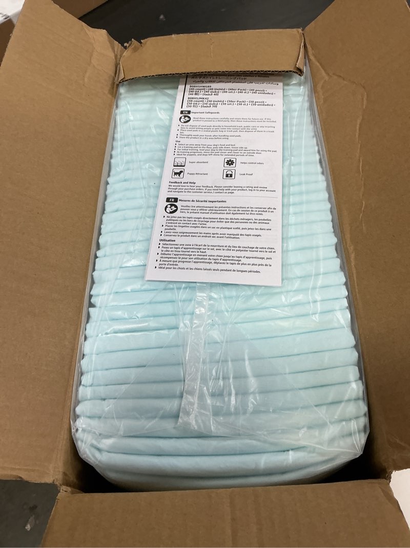 Condition photo showing New/Like New for amazon basics leak-proof dog and puppy potty training pee pads with quick-dry 5-layer surface, standard absorbency, giant size, 27.5 x 44 inch, blue & white, 40-pack giant (40 count)